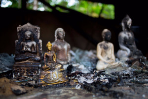 Burnt Buddha after a “Muslim” mob attack on 12 different Buddhist temples to the reaction of a tagged photo in the social media “facebook”. Vubon Shanti 100 feet Shingha Shajjha, Ramu, Cox’s Bazaar, Bangladesh, 01 October 2012.